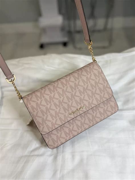 michael kors round sling bag|michael kors sling bag price.